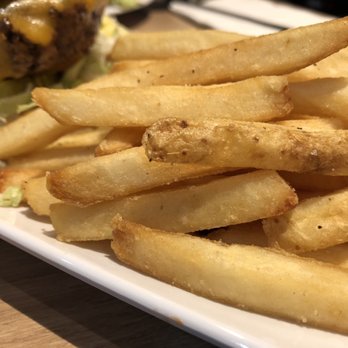 Chilis - Side of fries with my burger. They were hot and fresh. Delicious - Bars Near Me - Detroit, Michigan