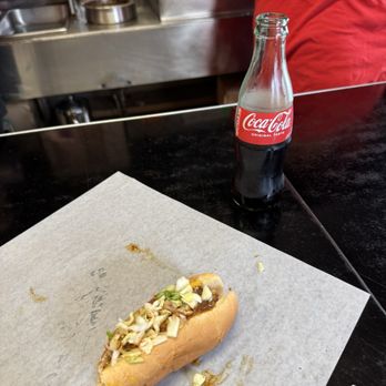 The Roast Grill Hot Weiners - Like the sign says, hot dogs and Coke. I couldn't wait to eat my first before snapping this picture. - Hot Dogs Near Me - Raleigh, North Carolina The Roast Grill Hot Weiners - Like the sign says, hot dogs and Coke. I couldn't wait to eat my first before snapping this picture. - Hot Dogs Near Me - Raleigh, North Carolina