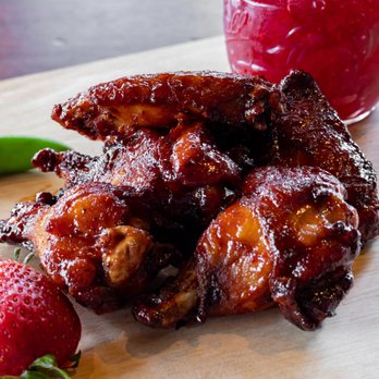 The Wing Experience - a plate of chicken wings and strawberries - Chicken Wings Near Me - West Chester, Ohio The Wing Experience - a plate of chicken wings and strawberries - Chicken Wings Near Me - West Chester, Ohio