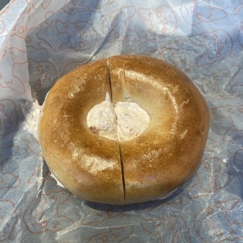 Pearl’s Bagels - Un evenly split bagel with most of the cream cheese in the hole - Bagels Near Me - Washington, DC, District of Columbia Pearl’s Bagels - Un evenly split bagel with most of the cream cheese in the hole - Bagels Near Me - Washington, DC, District of Columbia