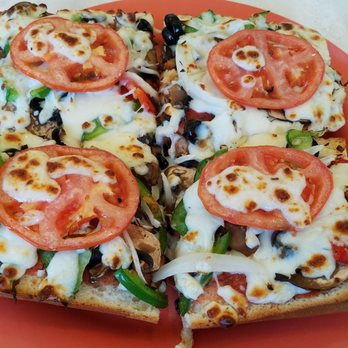Amina Pizzeria - Close up of my Veggie French Bread Pizza ($10.95) - Pizza Near Me - Honolulu, Hawaii Amina Pizzeria - Close up of my Veggie French Bread Pizza ($10.95) - Pizza Near Me - Honolulu, Hawaii