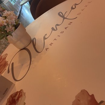 Olenka Peruvian Bistro - Sitting table decor - Bakeries Near Me - Weston, Florida