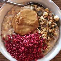 All In Porridge (vegan) with granola, dried raspberries and peanut butter....Excellent!