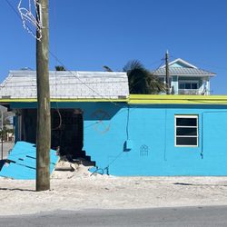 Sunset Beach Pavilion and Park - Collapsed building across the street from sunset beach. Most is roped off due to damages.