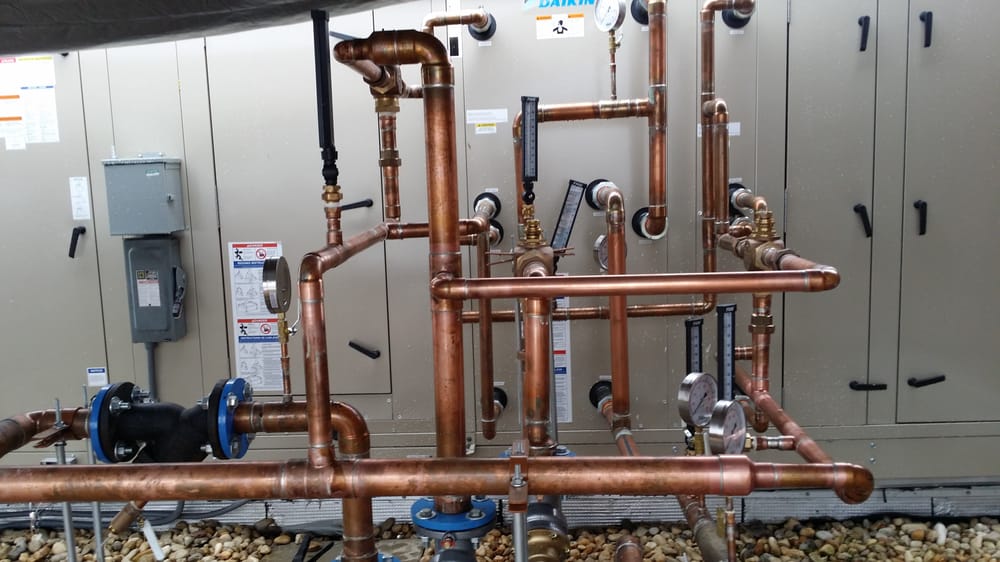 Slide of SJ Plumbing and Mechanical Building Services