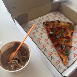 Soft service with cookie dust on top and a pepperoni slice with parm and basil. Soft service with cookie dust on top and a pepperoni slice with parm and basil.
