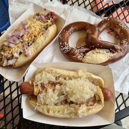two hot dogs and a pretzel