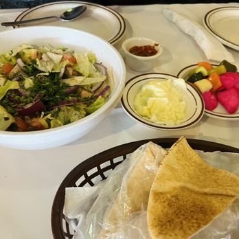 Al Natour Restaurant - Complimentary pre appetizer Bread with dipping sauce, pickles & Salad, - Middle Eastern Near Me - Plantation, Florida Al Natour Restaurant - Complimentary pre appetizer Bread with dipping sauce, pickles & Salad, - Middle Eastern Near Me - Plantation, Florida