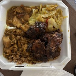 Davison Farmers Market - Curry and Jerk chicken, rice and beans and cabbage!