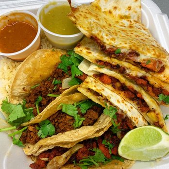 El Sabor Street Food - a plate of tacos, rice, and salsa - Food Trucks Near Me El Sabor Street Food - a plate of tacos, rice, and salsa - Food Trucks Near Me