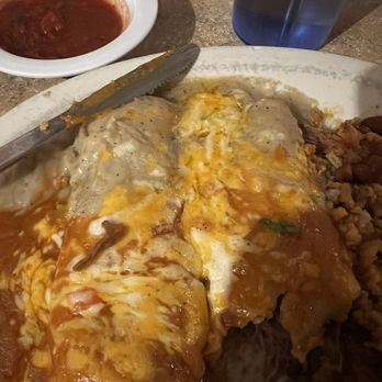 Via Delosantos - Beef enchiladas Christmas style (was supposed to have red and green sauce but the "green" sauce was tan and tasteless and gravy like). - Mexican Near Me - Phoenix, Arizona Via Delosantos - Beef enchiladas Christmas style (was supposed to have red and green sauce but the "green" sauce was tan and tasteless and gravy like). - Mexican Near Me - Phoenix, Arizona