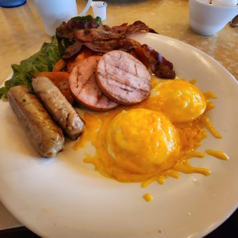 Sloan's - The Low Carb Grill
Cheddar eggs, two slices of bacon, two sausage links, two slices of Canadian style bacon and sliced grilled tomatoes. - Breakfast & Brunch Near Me - Indio, California Sloan's - The Low Carb Grill
Cheddar eggs, two slices of bacon, two sausage links, two slices of Canadian style bacon and sliced grilled tomatoes. - Breakfast & Brunch Near Me - Indio, California