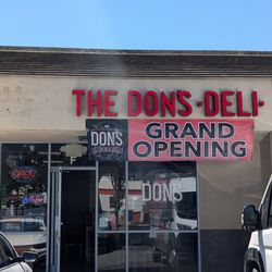 The Don's Deli - False advertising grand opening sign, clearly many years old.