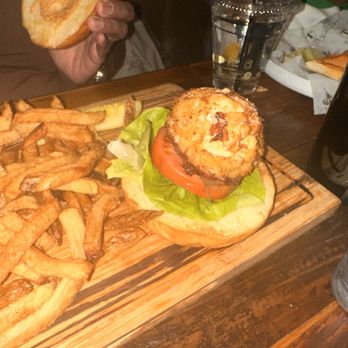 The Lodge Annapolis - Bread bigger than the crab cake it's holding. Where they do that at? - American Near Me - Annapolis, Maryland