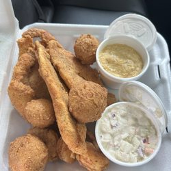 The Catfish Shack - Fried catfish filets (3) with cheese grits hush puppies and coleslaw