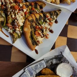 The Kings Arms Pub by Lew Murphy - Deep fried pickles, poutine, pesto avocado flatbread