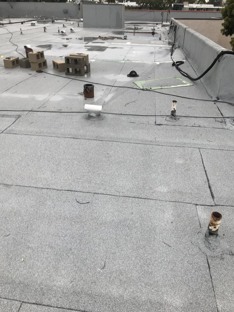 Slide of Valentine Roofing