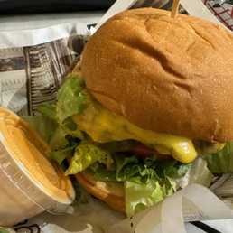 THE OUR BURGER Beef burger, government cheese, lettuce, tomato, onion, pickles and Paul's signature Wahl Sauce THE OUR BURGER Beef burger, government cheese, lettuce, tomato, onion, pickles and Paul's signature Wahl Sauce
