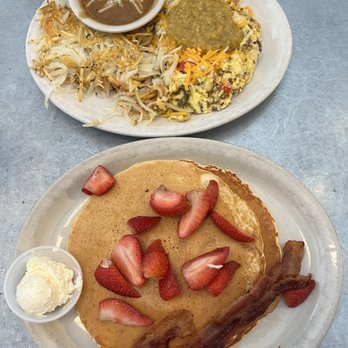 Norma's Cafe - Short Stack (2). with Bacon, Ham or Sausage with strawberries Chilaquiles that came with 2 tortillas - Diners Near Me - Plano, Texas Norma's Cafe - Short Stack (2). with Bacon, Ham or Sausage with strawberries Chilaquiles that came with 2 tortillas - Diners Near Me - Plano, Texas