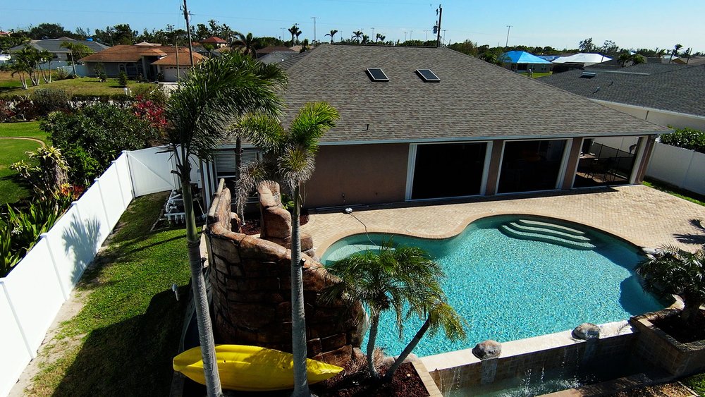 Slide of Four Peaks Roofing