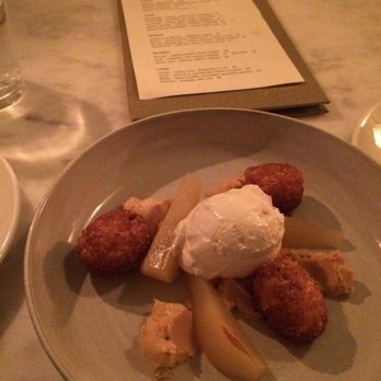 Grey Gardens - Poached pear with sake sorbet, fried dough fritters, and almond butter. - Wine Bars Near Me - Toronto, Ontario Grey Gardens - Poached pear with sake sorbet, fried dough fritters, and almond butter. - Wine Bars Near Me - Toronto, Ontario