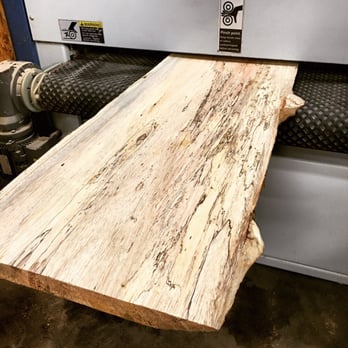 Werk Arts - Sending a thick slab of Albizia through our 44" wide belt sander. Soon to be a table top - Furniture Stores Near Me - Honomu, Hawaii