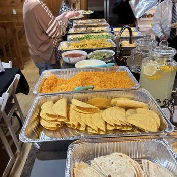 El Sonador - Taco bar set up with chicken and beef, rice,beans,cheese, lettuce , queso, salsa, guacamole - Mexican Near Me - Gatlinburg, Tennessee