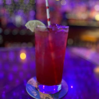 Wonder Bar - a drink with a straw and a lime slice - Bars Near Me - Cleveland, Ohio Wonder Bar - a drink with a straw and a lime slice - Bars Near Me - Cleveland, Ohio