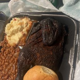 Picture doesn't do it justice but literally the chicken is black from being burnt. Picture doesn't do it justice but literally the chicken is black from being burnt.