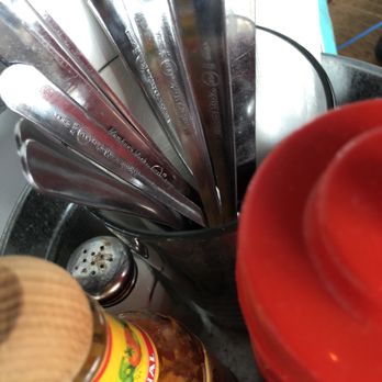 The Shack - Caddy with multiuse items not cleaned between customers and unwrapped utensils - Seafood Near Me - Old Orchard Beach, Maine The Shack - Caddy with multiuse items not cleaned between customers and unwrapped utensils - Seafood Near Me - Old Orchard Beach, Maine