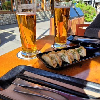 Block Kitchen + Bar - 2 local beers, sunshine and the kimchi and pork gozas so tasty! - Sandwiches Near Me - Banff, Alberta Block Kitchen + Bar - 2 local beers, sunshine and the kimchi and pork gozas so tasty! - Sandwiches Near Me - Banff, Alberta