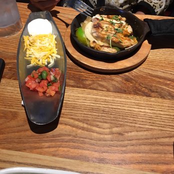 Chili's - Side of cheese sour cream and salsa is bigger than main dish haha and main dish is the worst fajitas ever - Tex-Mex Near Me - Whittier, California