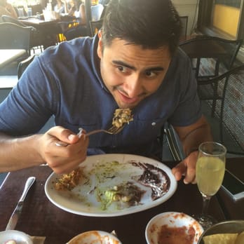 Cha Cha's Latin Kitchen - Yummy in his tummy! Crap/ shrimp enchiladas! - Bars Near Me - Brea, California