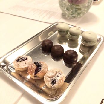 Charleston - Complimentary sweets--blackberry pasty, chocolate bon bon, cardamom-pistachio macaron. - New American Near Me - Baltimore, Maryland
