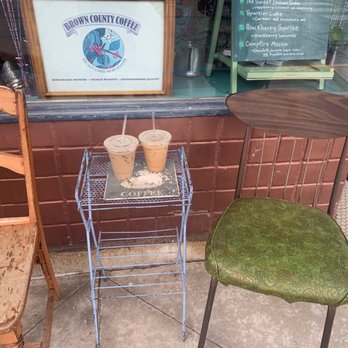 Cherry Ghost Coffee House - Out front, iced vanilla coffee and iced chai latte - Coffee & Tea Near Me - Washington, Indiana
