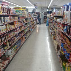 Valero - Aisle stocked full of grocery items.