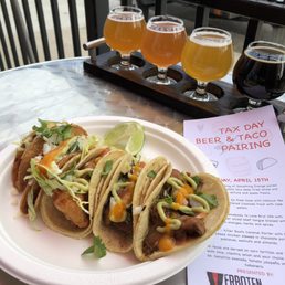 a plate of tacos and beer a plate of tacos and beer