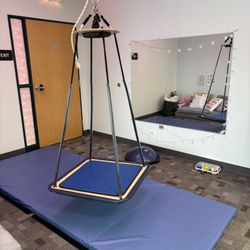 Midwest Pediatric Therapy - Big Gym - platform swing for our friends who need movement to help them regulate