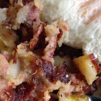 The Classic Cafe - Close up of the Corned Beef Hash and over easy eggs - Breakfast & Brunch Near Me - Providence, Rhode Island The Classic Cafe - Close up of the Corned Beef Hash and over easy eggs - Breakfast & Brunch Near Me - Providence, Rhode Island