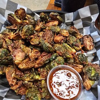 Molly's in Soulard - Brussels Sprouts with Thai chili sauce - Pubs Near Me - St. Louis, Missouri Molly's in Soulard - Brussels Sprouts with Thai chili sauce - Pubs Near Me - St. Louis, Missouri