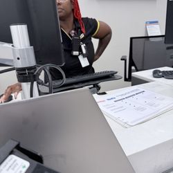 Dollar Car Rental - Hertz employee "helping"