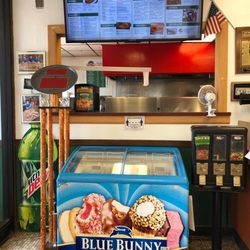 Tnt Dynamite Pizza & Hoagies - Electric menu board on TV