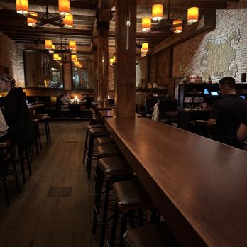 The Dara - Interior, long table down the center, booths along the sides and back. - Thai Near Me - Baltimore, Maryland The Dara - Interior, long table down the center, booths along the sides and back. - Thai Near Me - Baltimore, Maryland