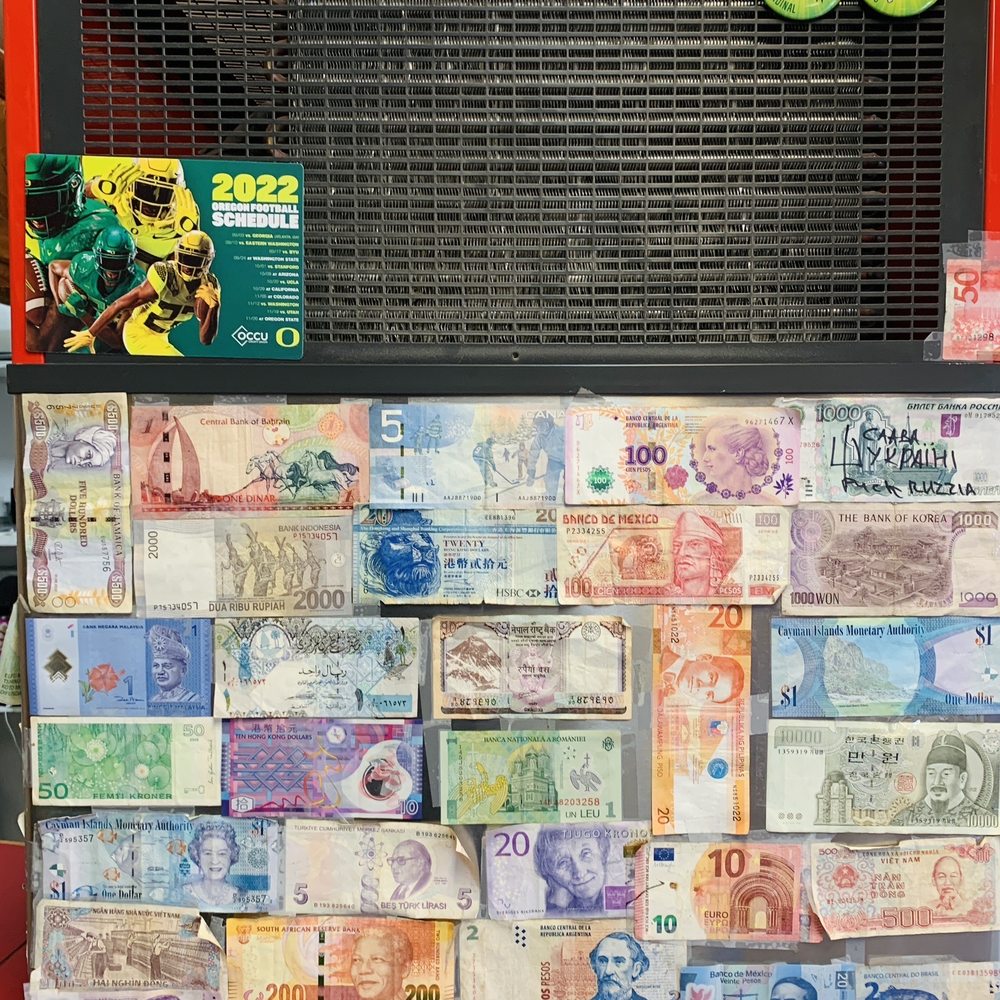 Sy's New York Pizza - a display of currency - Pizza Near Me - Eugene, Oregon Sy's New York Pizza - a display of currency - Pizza Near Me - Eugene, Oregon
