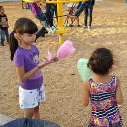 Making friends over cotton candy... at the park!