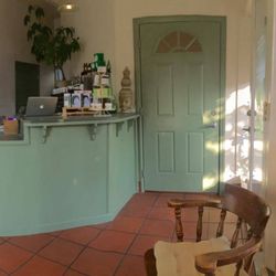 Acupuncture & Homeopathic Studio - The waiting room and front desk- airy light and beautiful