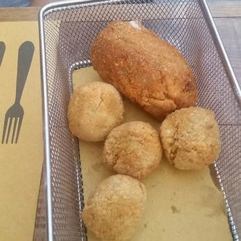 Fiore di Zucca - Deep fried rice ball, and fried stuffed olives. Delicious - Italian Near Me - Roma, AG Fiore di Zucca - Deep fried rice ball, and fried stuffed olives. Delicious - Italian Near Me - Roma, AG