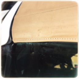 Hand stitched trim repair. Hand stitched trim repair.