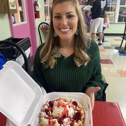 Funnel cake with strawberry and soft serve. Funnel cake with strawberry and soft serve.