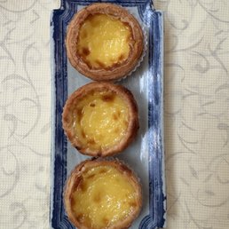 Portuguese baked custard tarts. Portuguese baked custard tarts.